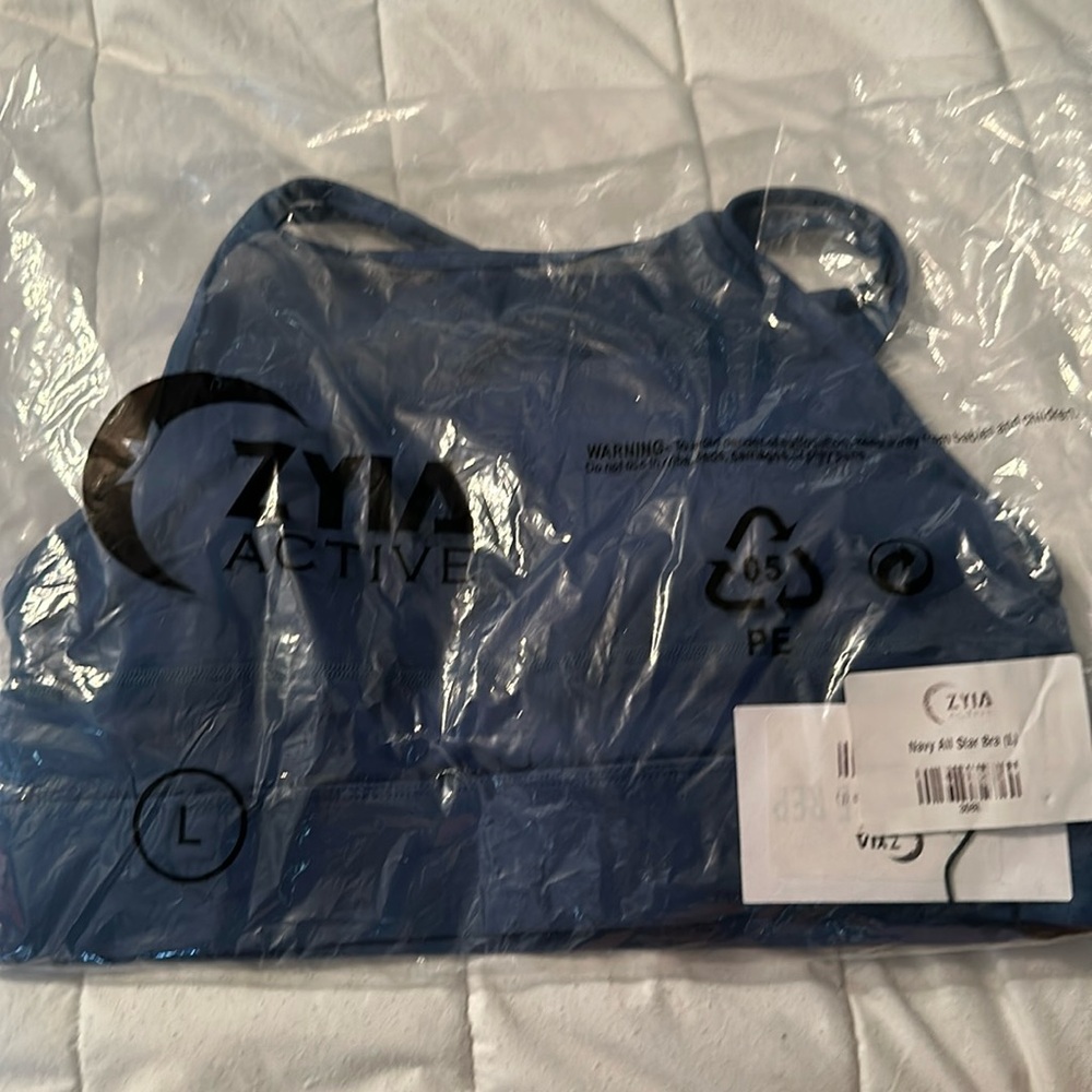 Brand new Zyia sports bra navy all star size L
